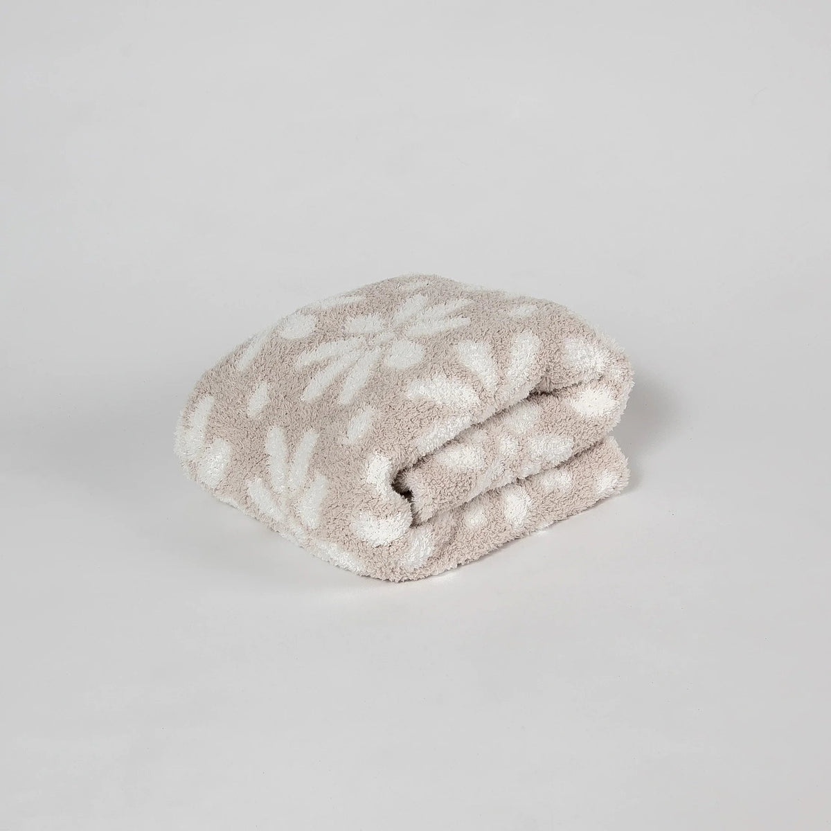 Couverture pour tout-petit imprimée marguerites beiges et blanches
