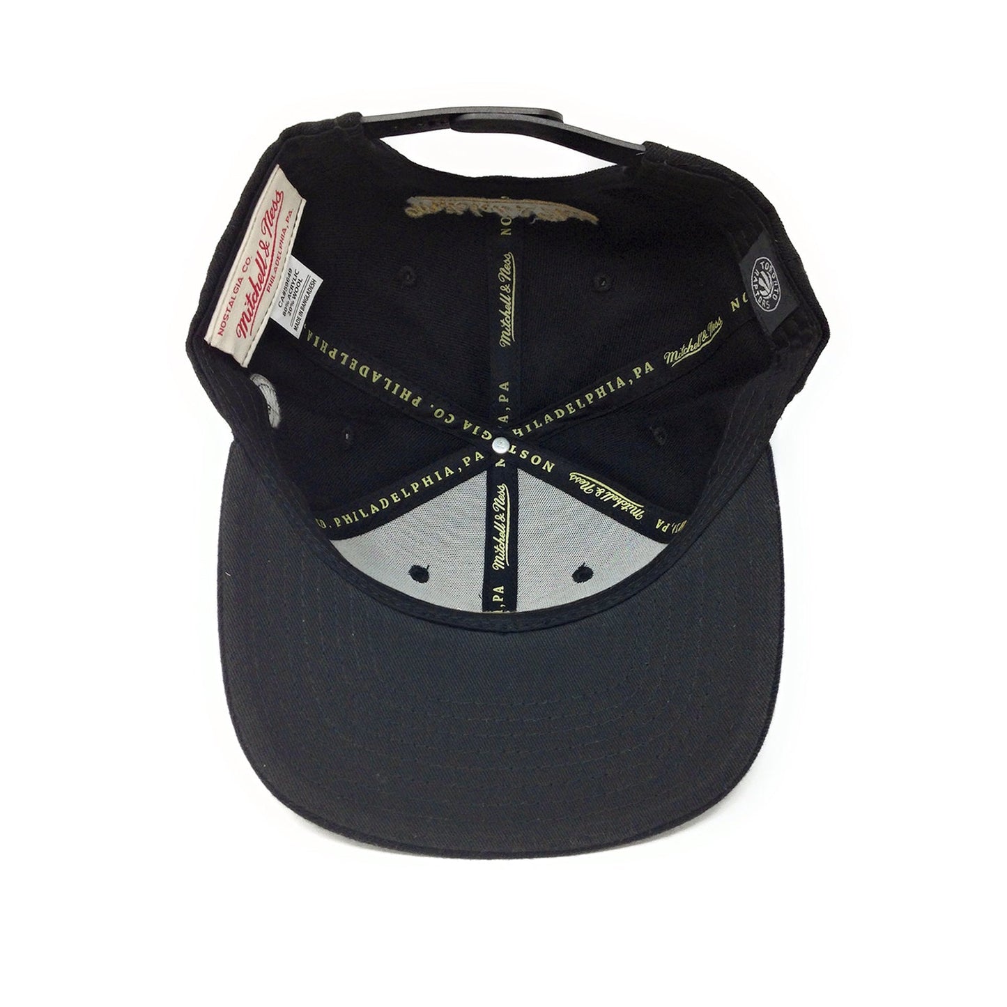 Casquette Snapback Mitchell & Ness Toronto Raptors Partial Claw Logo Rouge/Or/Noir