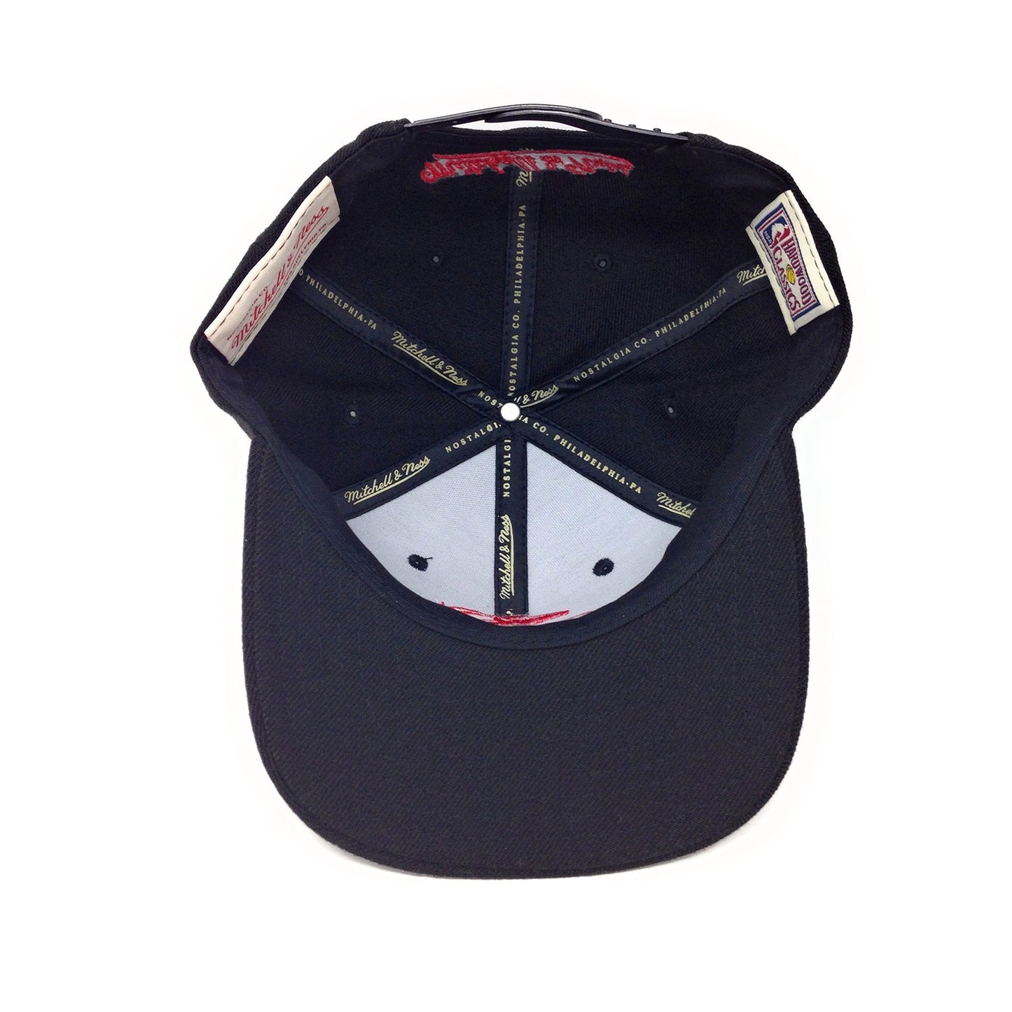 Casquette snapback Mitchell and Ness Toronto Raptors Logo griffe partielle rouge/noir