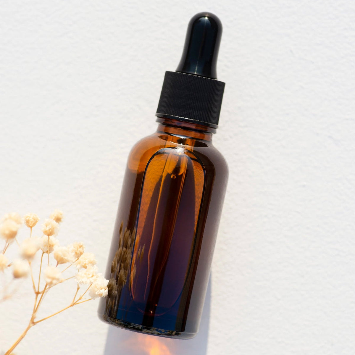 Sérum pour le visage et massage Gua Sha GLØD argan & rose musquée