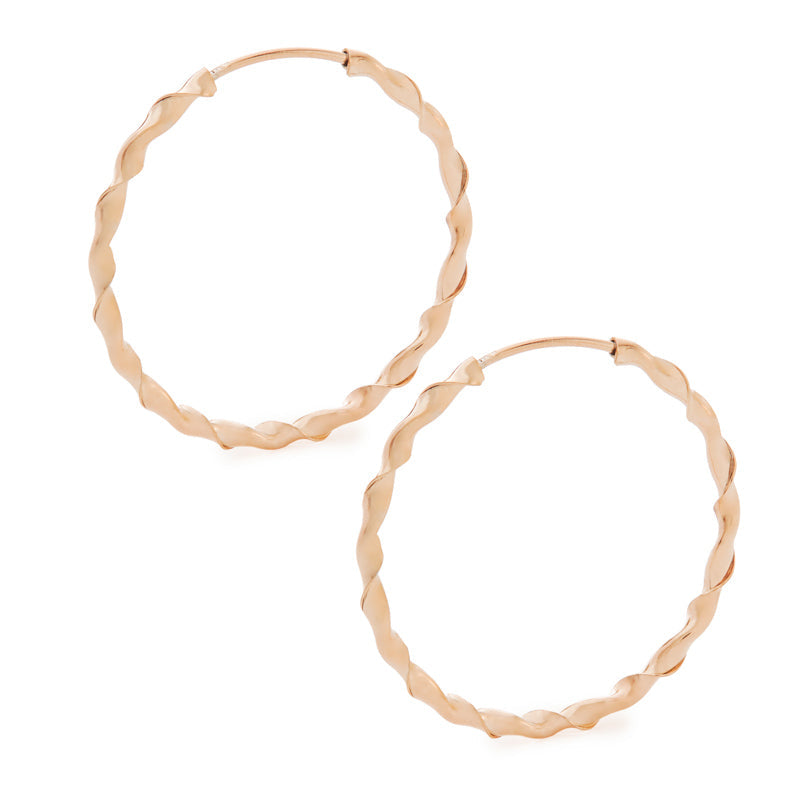 Boucles d'oreilles créoles torsadées en or rose 47 mm