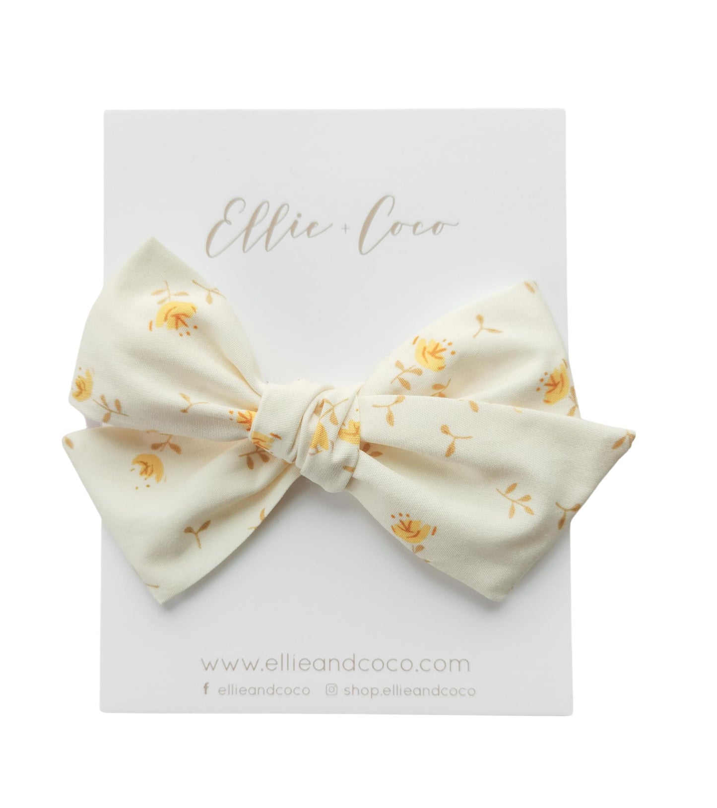 Grand nœud jaune et crème à fleurs