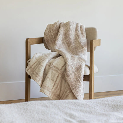 Grand jeté en plaid beige rougissant et blanc