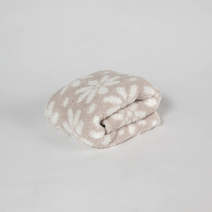 Couverture pour tout-petit imprimée marguerites beiges et blanches