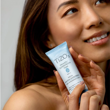 Base de maquillage solaire teintée TiZO® TiZO3 FPS 40