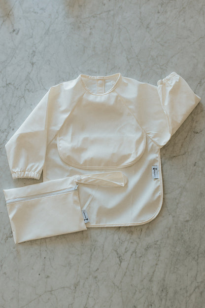 Bavette imperméable à manches longues avec poche | 6-24 mois