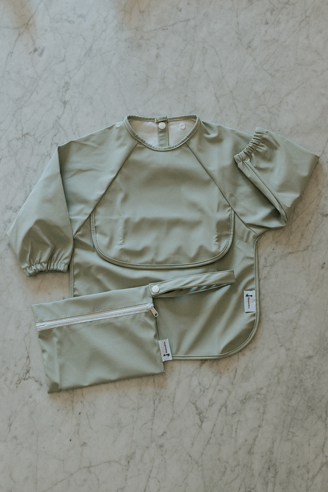 Bavette imperméable à manches longues avec poche | 6-24 mois