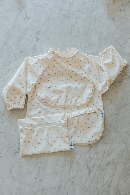 Bavette imperméable à manches longues avec poche | 6-24 mois