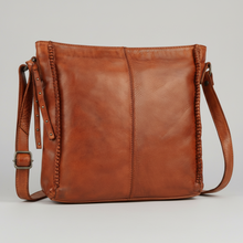 Sac bandoulière MET en cuir premium. Besace carrée avec détails tressés sur les bords