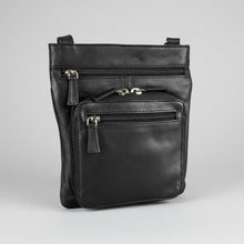 Sac bandoulière JBG Slim en cuir véritable. Sac de voyage avec protection RFID et poches à fermetures éclair multiples.