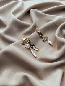 Les boucles d'oreilles asymétriques Kenzie