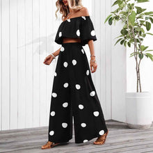Ensemble élégant de haut tube et pantalon à pois pour femme