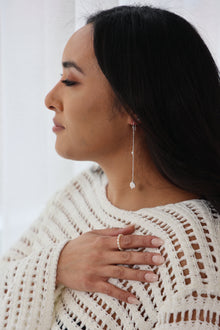 Les boucles d'oreilles pendantes Kate