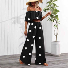 Ensemble élégant de haut tube et pantalon à pois pour femme