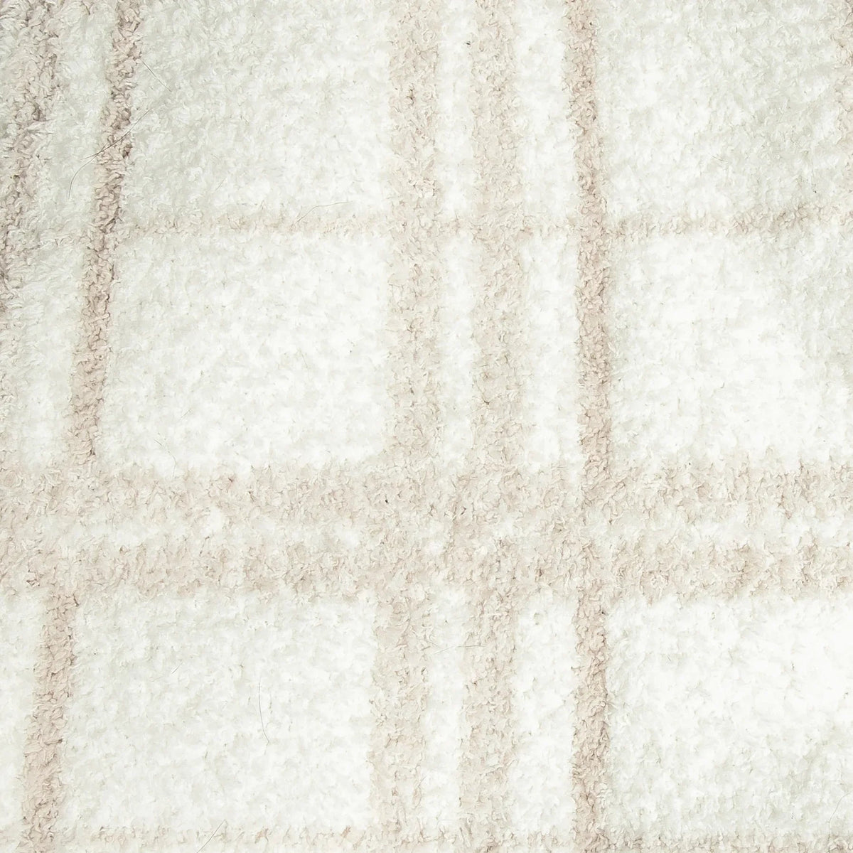 Grand jeté en plaid beige rougissant et blanc