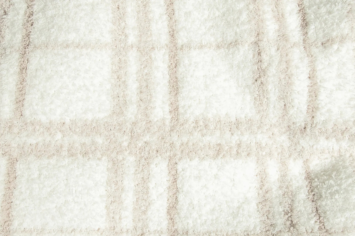 Grand jeté en plaid beige rougissant et blanc