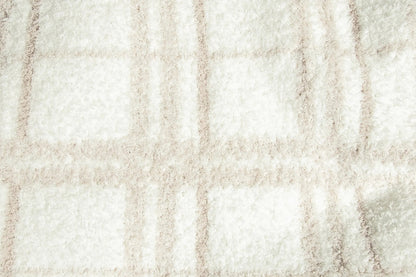 Grand jeté en plaid beige rougissant et blanc