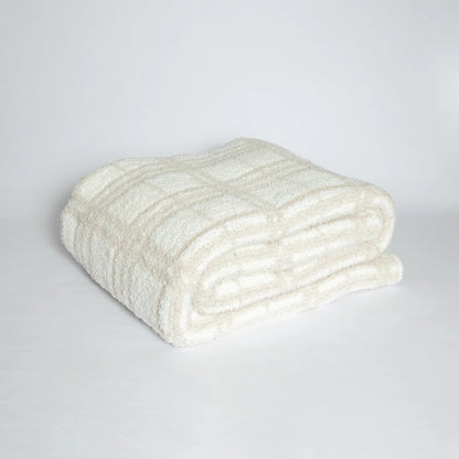 Grand jeté en plaid beige rougissant et blanc