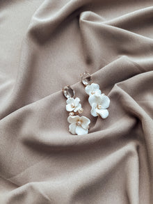 Les boucles d'oreilles pendantes Arriana
