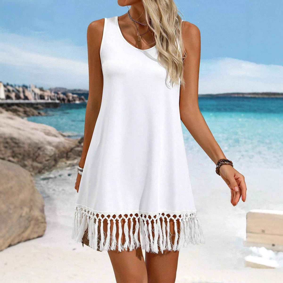 Robe mi-longue asymétrique sans manches à pompons, style européen et américain, pour femme, couleur unie