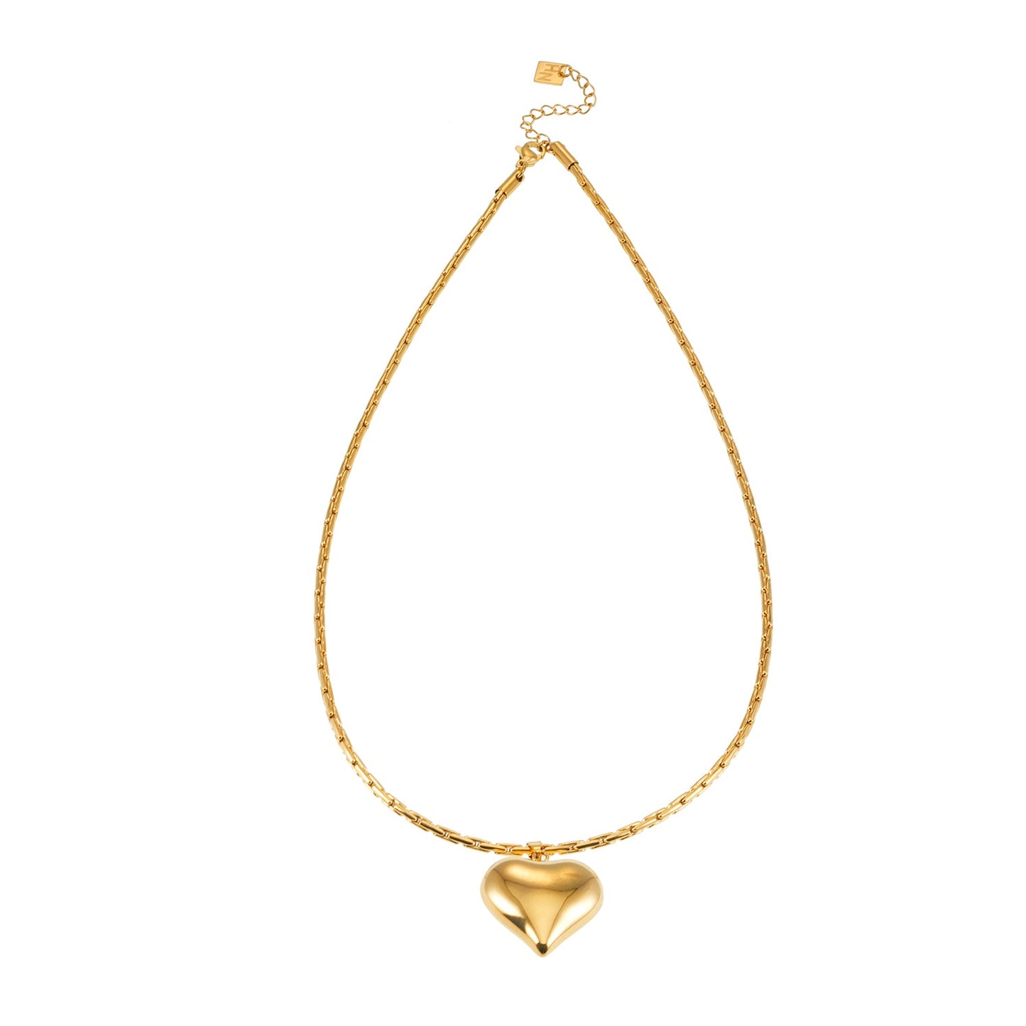 ABEL : Chaîne en câble ouvragée avec pendentif Cœur gonflé en or.