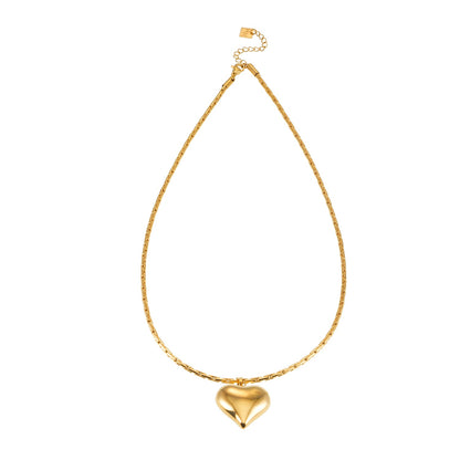 ABEL : Chaîne en câble ouvragée avec pendentif Cœur gonflé en or.