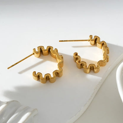 Style ALMORA : Boucles d'oreilles créoles torsadées d'inspiration rétro en or