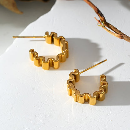 Style ALMORA : Boucles d'oreilles créoles torsadées d'inspiration rétro en or