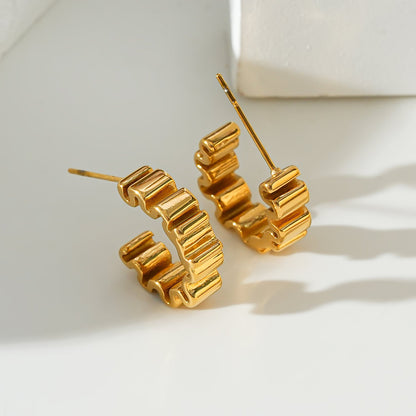 Style ALMORA : Boucles d'oreilles créoles torsadées d'inspiration rétro en or