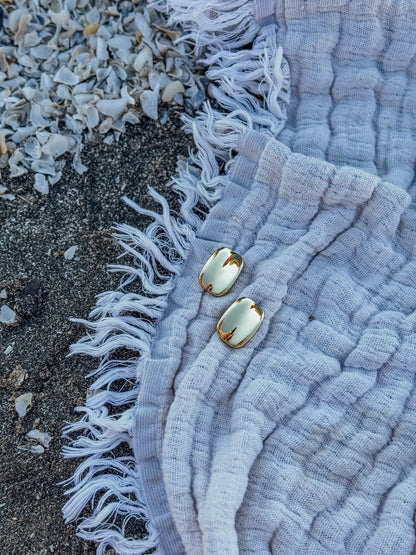 Les boucles d'oreilles Kerr