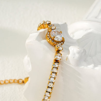 BEREA Gold : Bracelet de tennis avec grand zircon (CZ) central – Élégance intemporelle pour chaque occasion