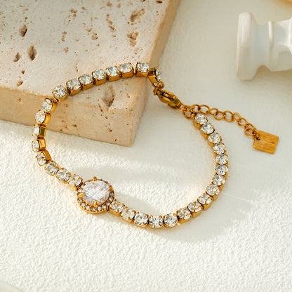 BEREA Gold : Bracelet de tennis avec grand zircon (CZ) central – Élégance intemporelle pour chaque occasion