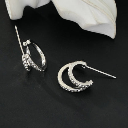 BOTTEGA: Créoles en argent à double rangée de zircons cubiques (CZ) pavés