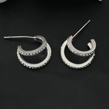 BOTTEGA: Créoles en argent à double rangée de zircons cubiques (CZ) pavés