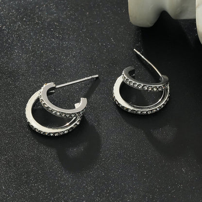 BOTTEGA: Créoles en argent à double rangée de zircons cubiques (CZ) pavés