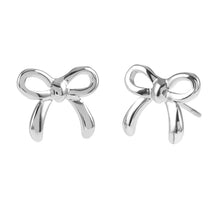 BOW: Silver Toned White Gold Bow Shaped Stud Earrings