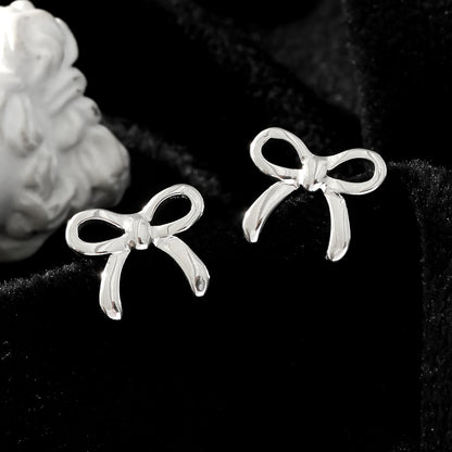 BOW: Boucles d'oreilles clous en forme de nœud, or blanc ton argent