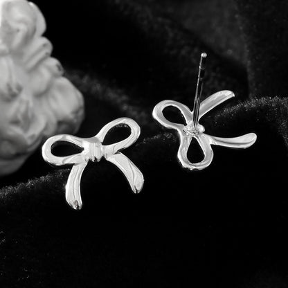 BOW: Boucles d'oreilles clous en forme de nœud, or blanc ton argent