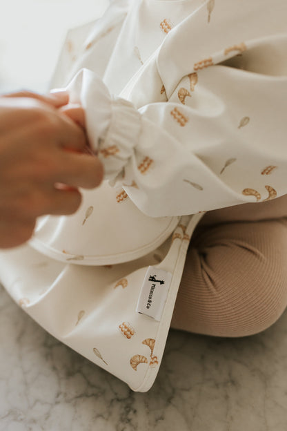 Bavette à manches longues imperméable avec poche | 6-24 mois
