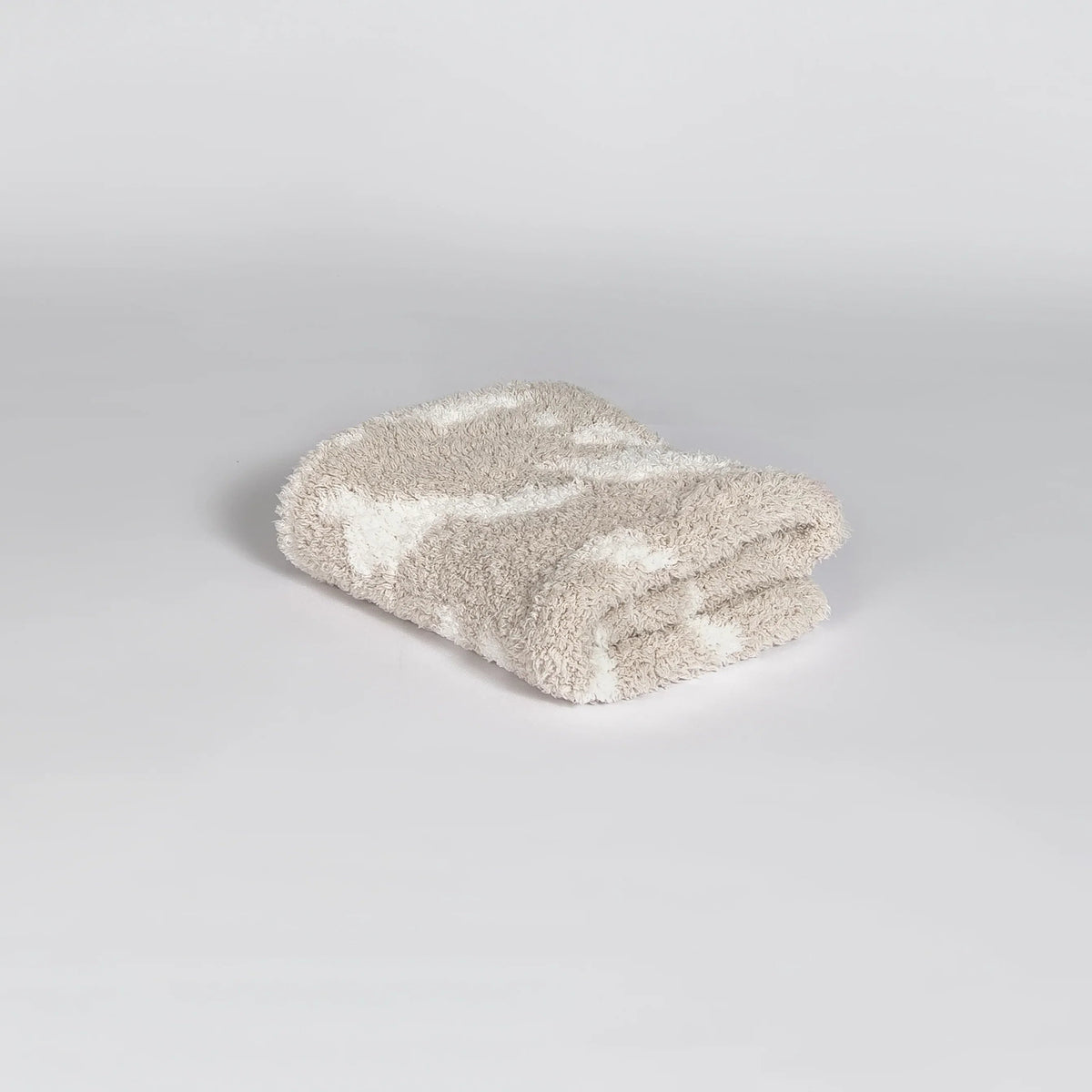 Doudou imprimé vache beige rougissant et blanc