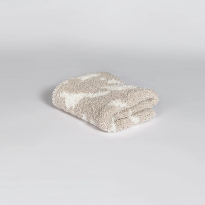 Doudou imprimé vache beige rougissant et blanc