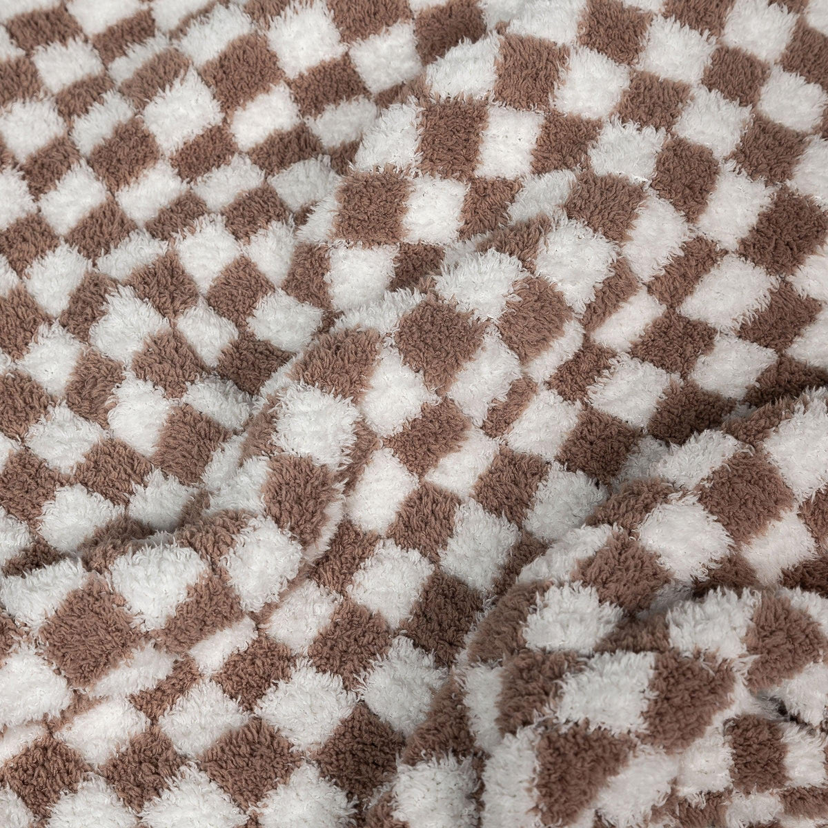 Couverture pour tout-petit à carreaux blancs et couleur chocolat