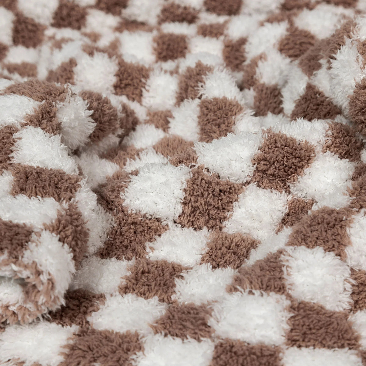 Couverture pour tout-petit à carreaux blancs et couleur chocolat