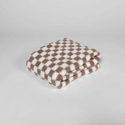 Couverture pour tout-petit à carreaux blancs et couleur chocolat
