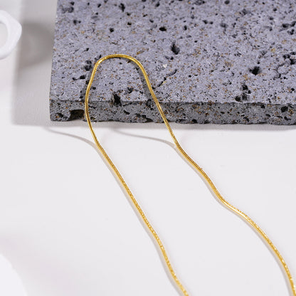 CHASTITY: Collier chaîne doré texturé peau de serpent délicate