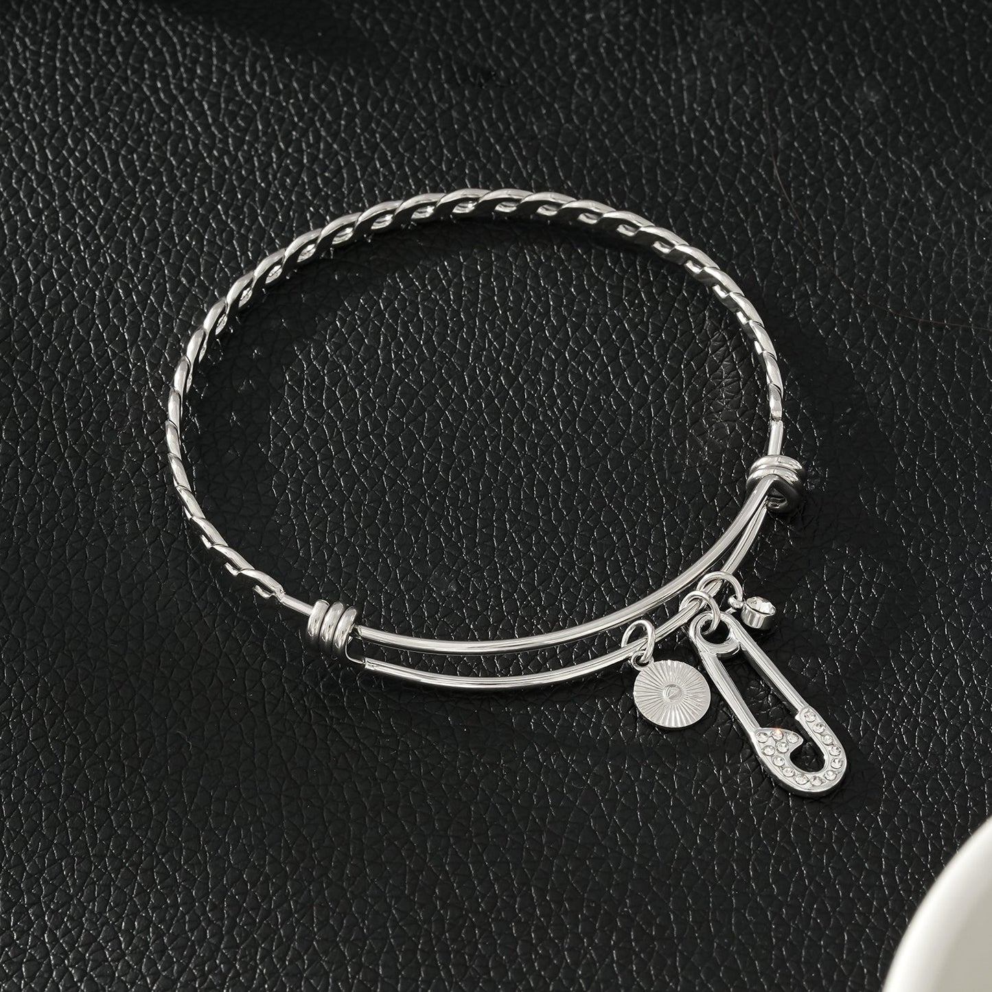 CHRISTINA : Bracelet en or blanc (ton argenté) orné de breloques