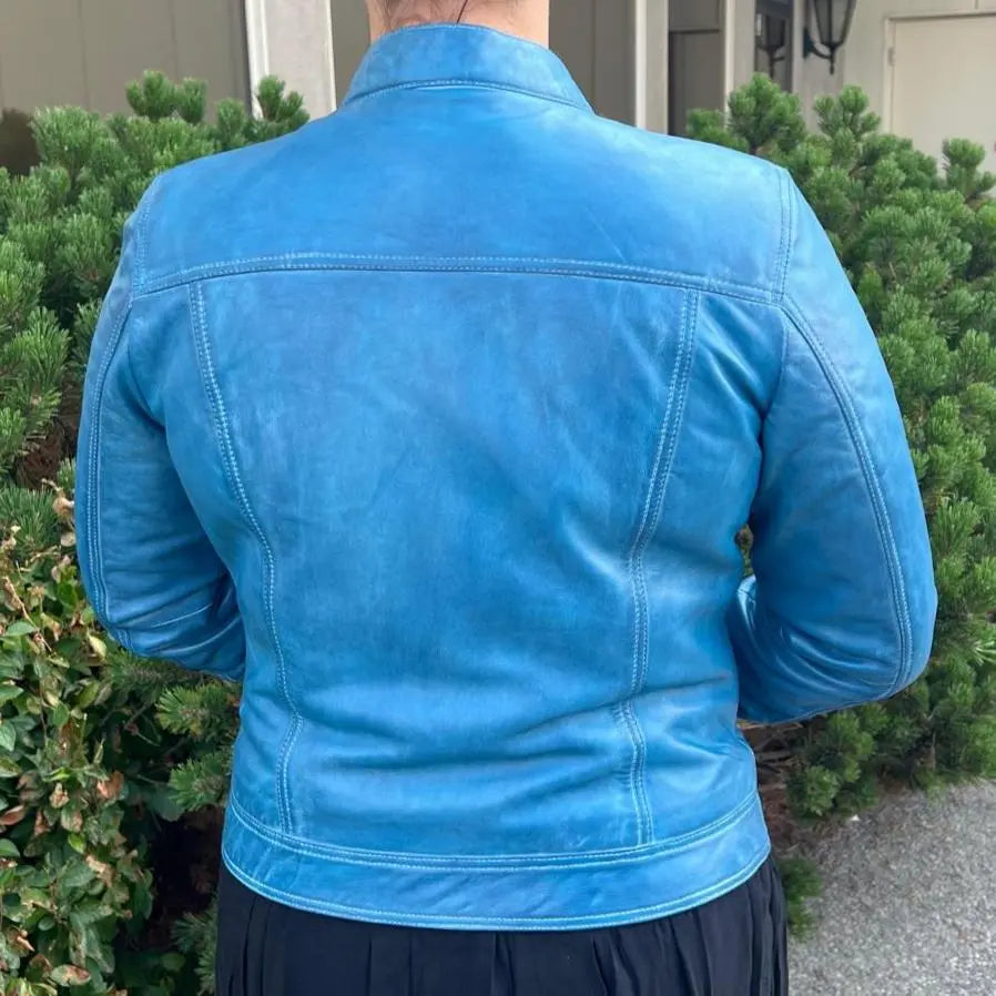 Blouson classique en cuir d'agneau pour femme avec col à bouton-pression