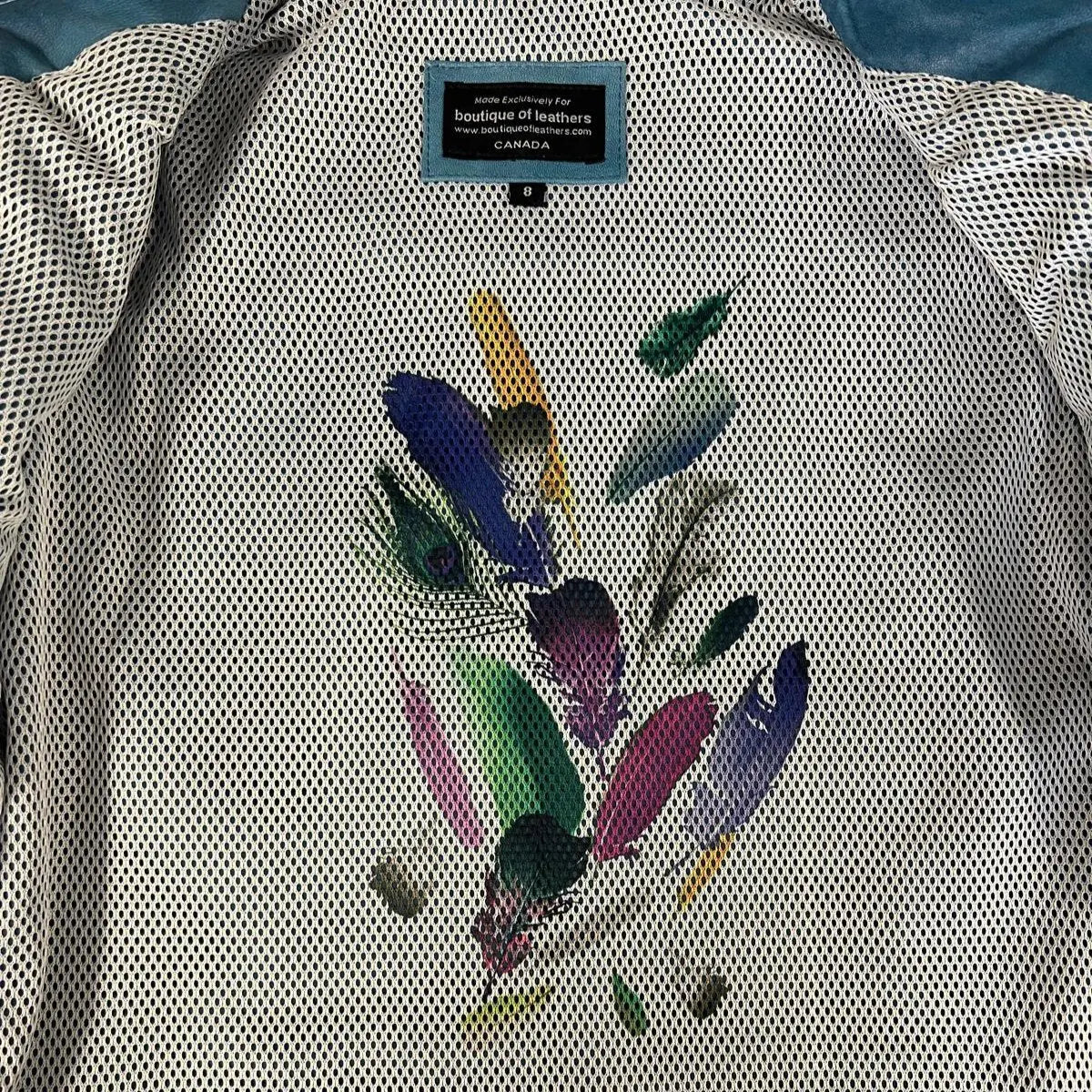 Blouson classique en cuir d'agneau pour femme avec col à bouton-pression
