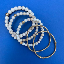 Empilement de bracelets Colour Me Gold