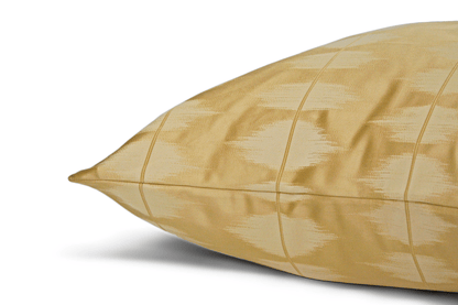 Housse de coussin Ikat doré